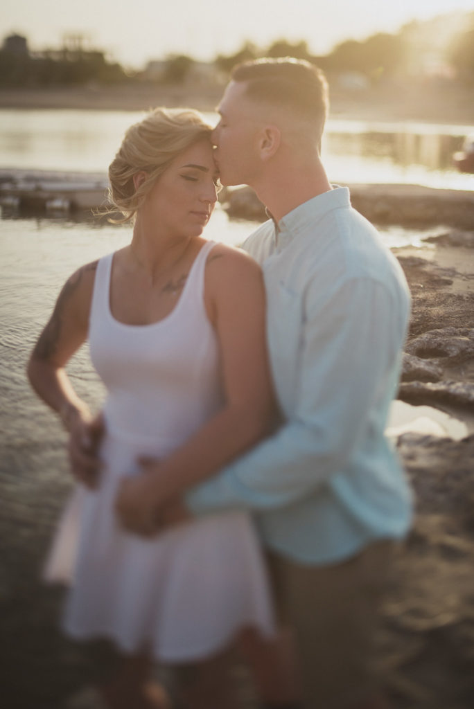 American couple proudly serving their country photo shoot, on the beach of Chania - Wedding Photographer